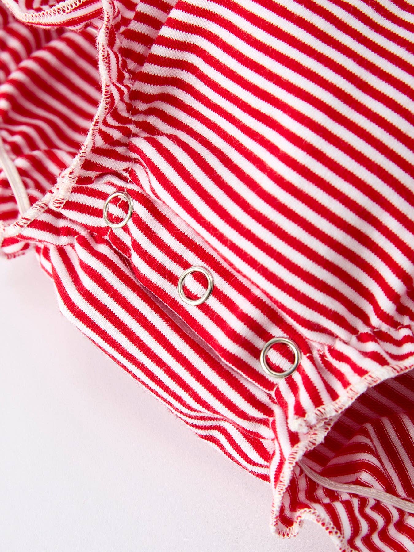 Holiday Baby Girls Romper with Embroidered Christmas Lights and Red Bow Details