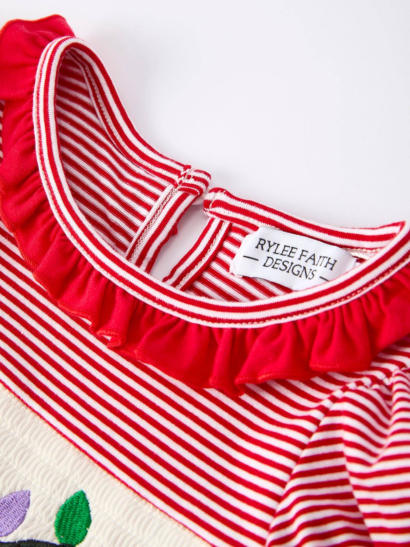 Holiday Girls Dress with Embroidered Christmas Lights and Red Bow Details