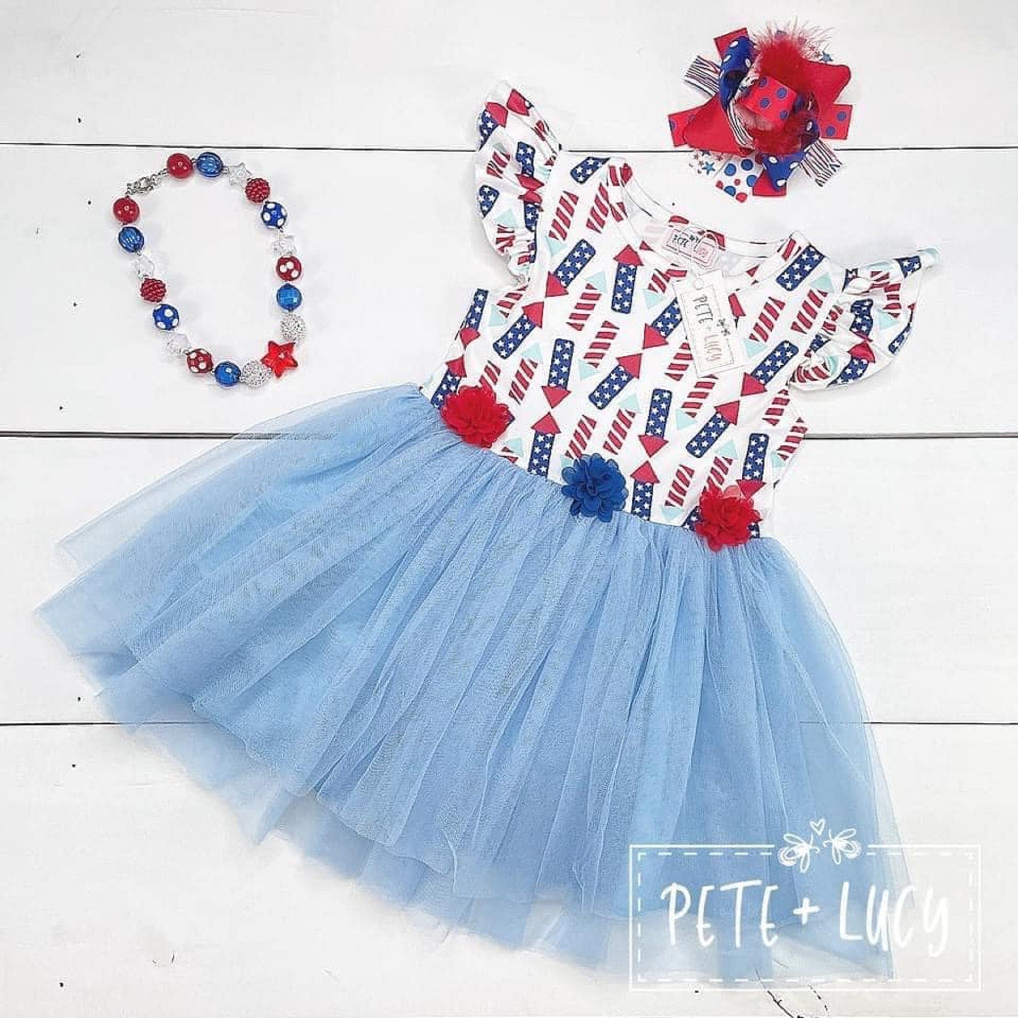 Pete and Lucy brand. Denim vest, Tulle skirt bottom super cute for shops little girls.