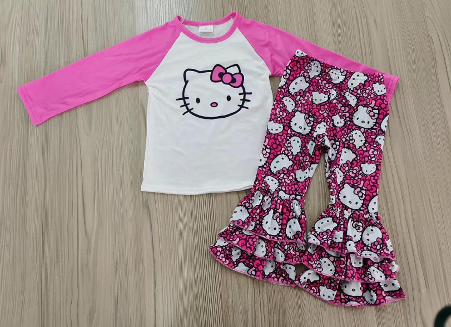 Cat Long Sleeve Reglan with Ruffled Bottoms